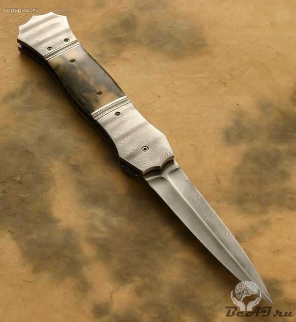 Ножи из дамасской стали ( 15 фото)